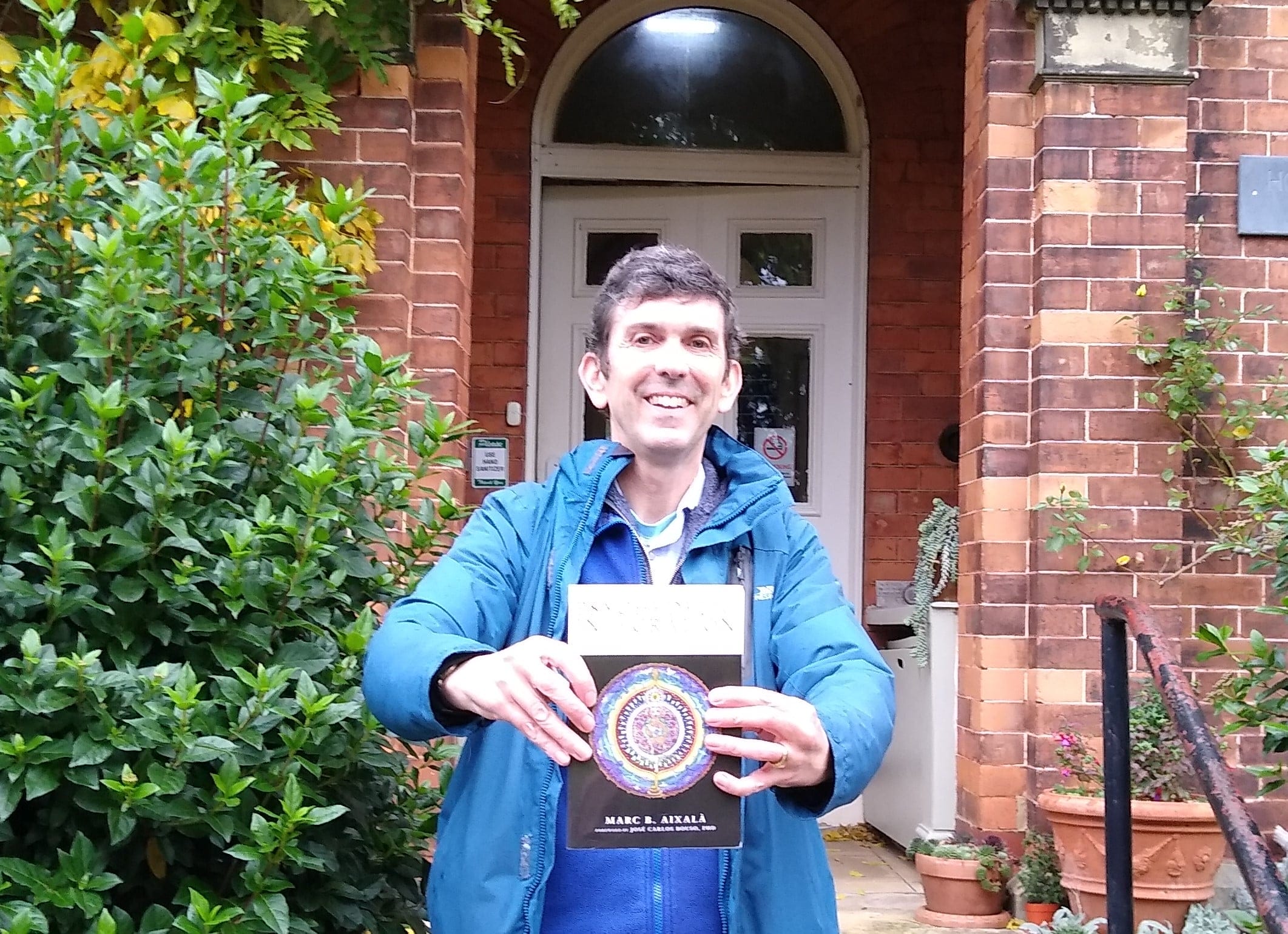 John Ablett with Psychedelic Integration cover John Ablett holding a copy of Psychedelic Integration